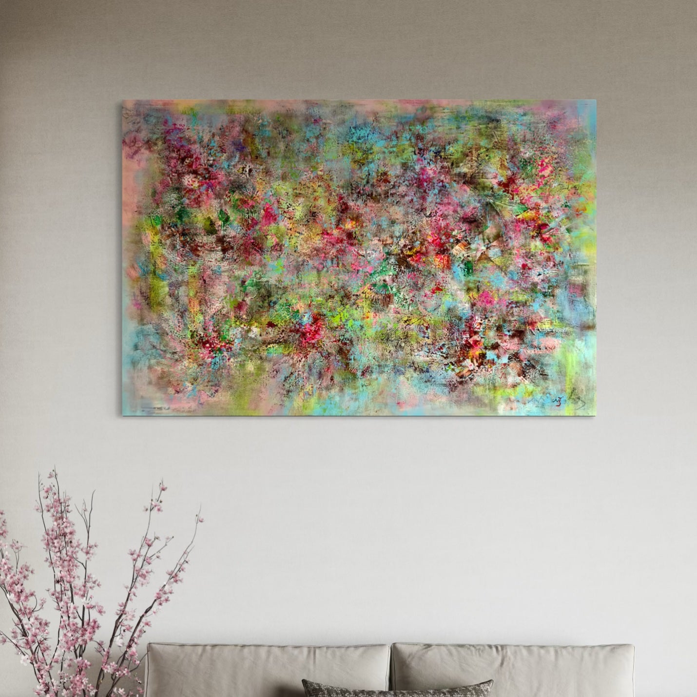 Abstract multicolored painting on a wall above a sofa