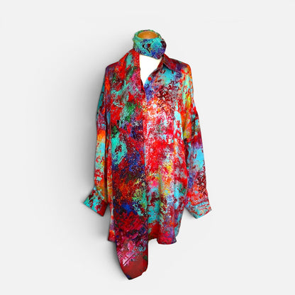 Red silk scarf and shirt with a pattern on a white background