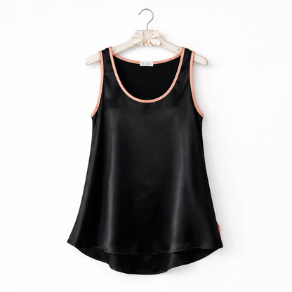 Black satin tank top with pink trim on a white background