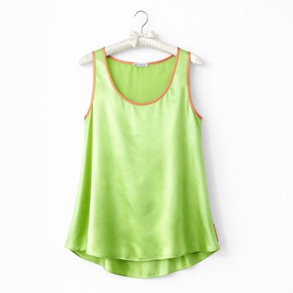 Green tank top with orange trim on a white hanger against a white background