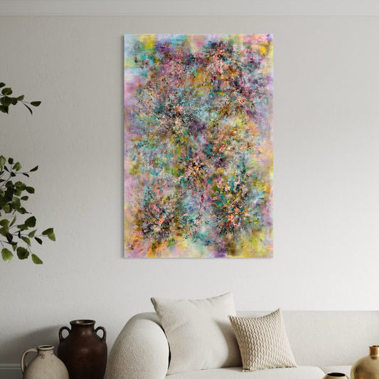 Colorful abstract painting on a wall above a sofa with decorative pillows.