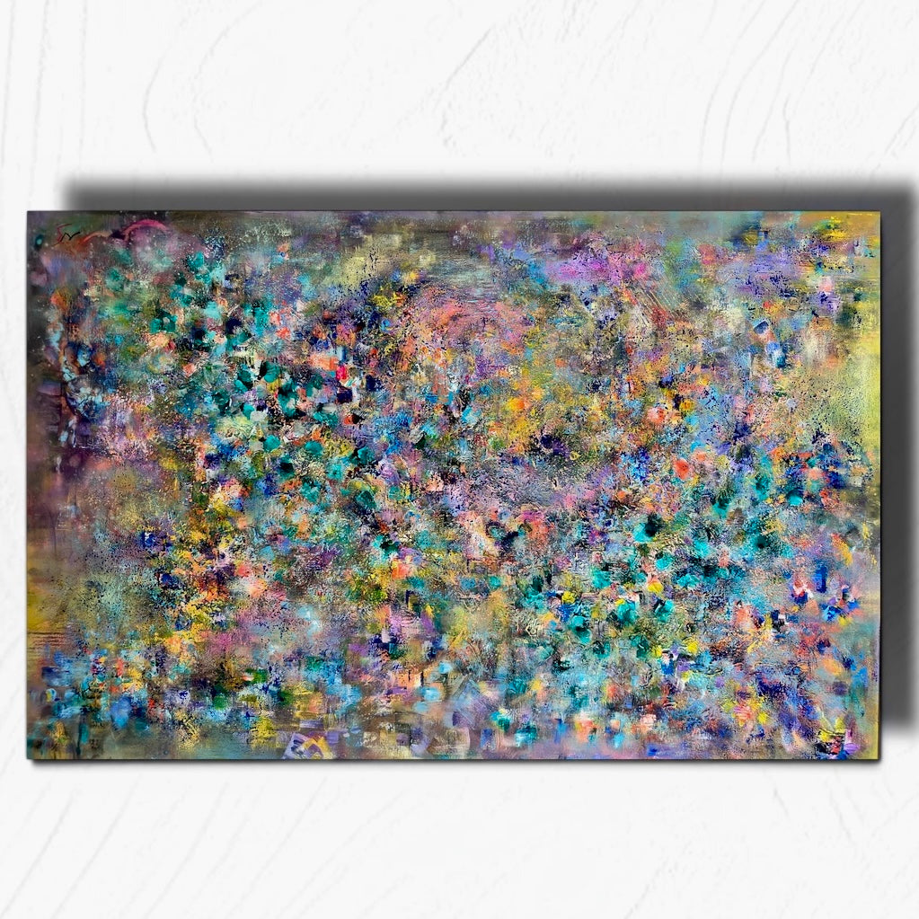 An abstract rectangular canvas painting with a textured, expressive brushstroke pattern in a mix of blue, green, purple, yellow, and gray tones, displayed against a light gray wall.