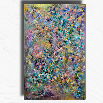 Abstract canvas wall art featuring a dense, textured impasto pattern in a mix of teal, blue, purple, yellow, and green tones, displayed against a light gray marble-textured background.
