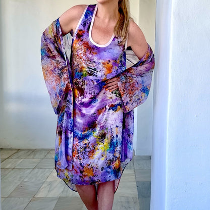 woman wearing silk dress with chiffon cardigan