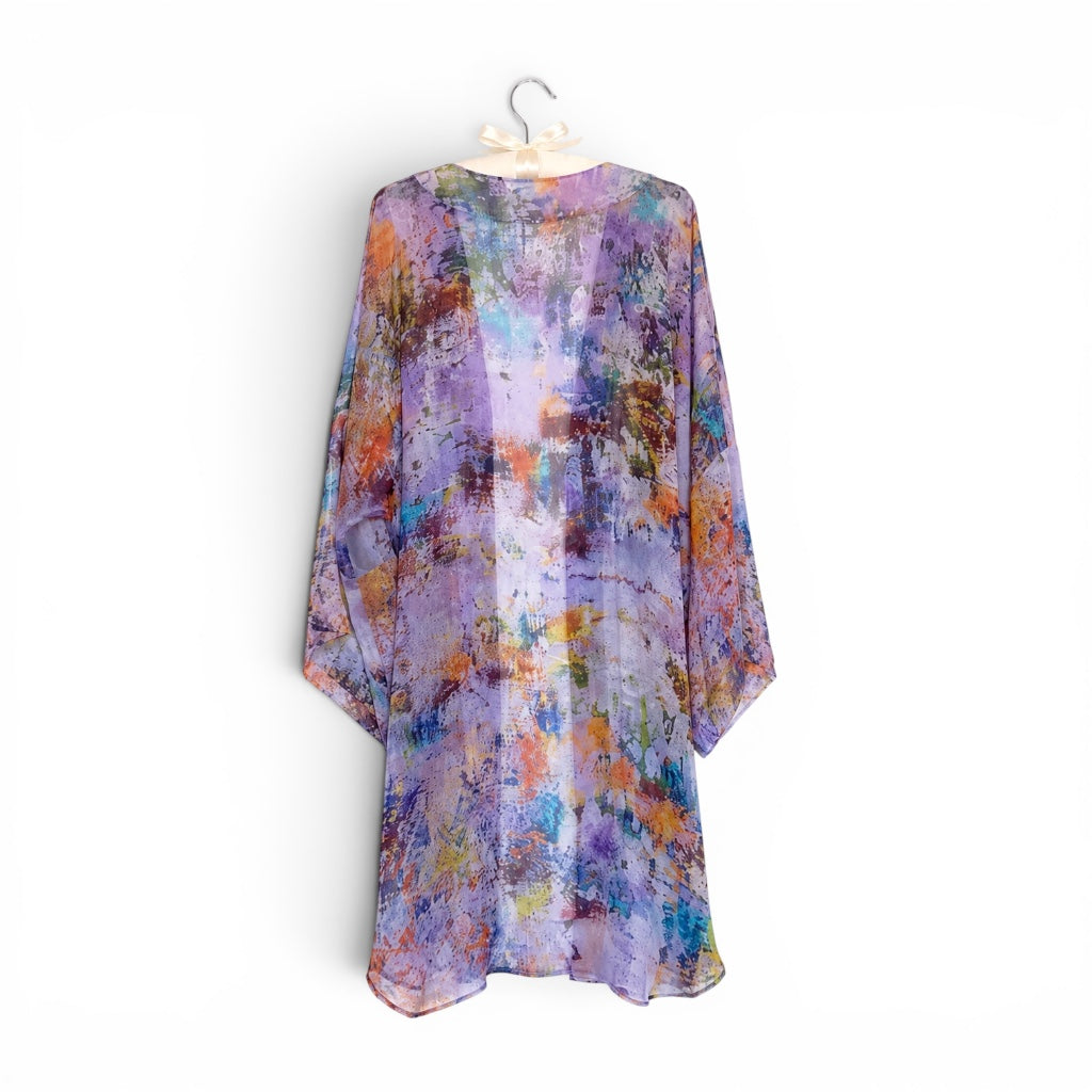 Colorful dress with abstract pattern on a white background