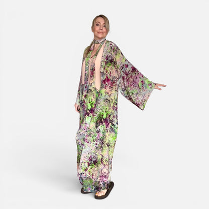 Woman wearing a floral dress on a white background
