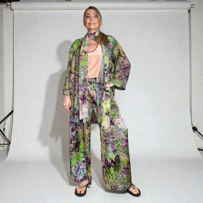 Woman wearing a floral outfit on a white background