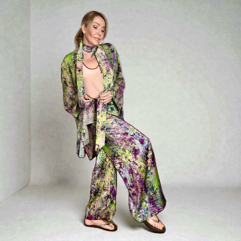 Woman wearing a silk set Underwater Amazons with six shirt trousers and top