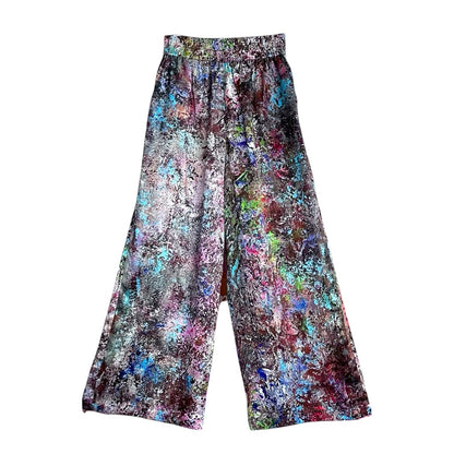Colorful patterned pants on a white background